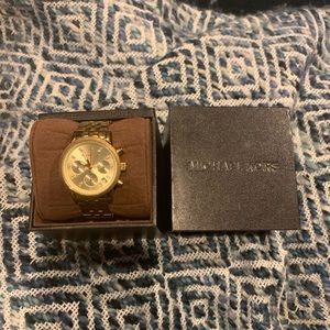 Michael Kors women’s gold watch